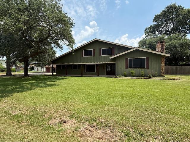 176 Ridgewood St, Bridge City, TX 77611 - view of front of property with a chimney