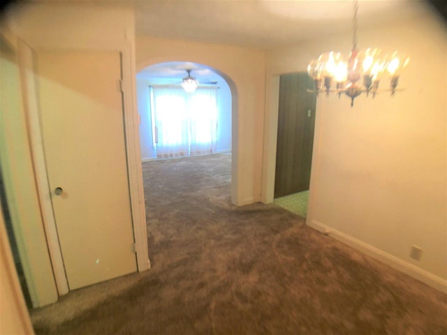 3812 30th, Port Arthur, TX 77642 - hallway with carpet floors, a chandelier, arched walkways, and baseboards