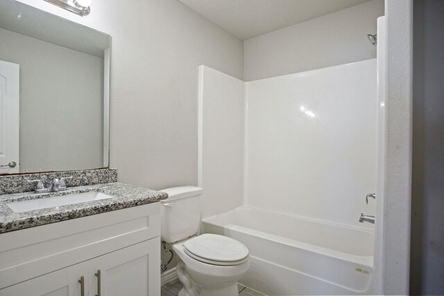 full bathroom featuring vanity, toilet, and tub / shower combination