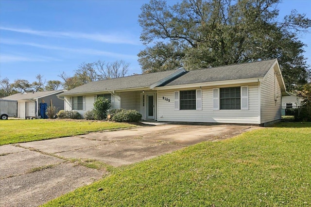 ranch-style house with a front lawn