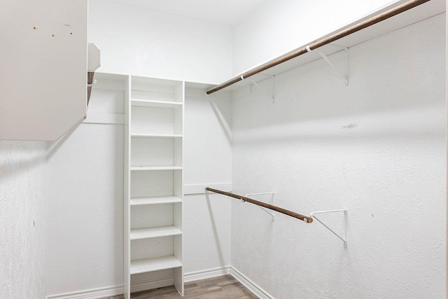 walk in closet featuring light wood-type flooring