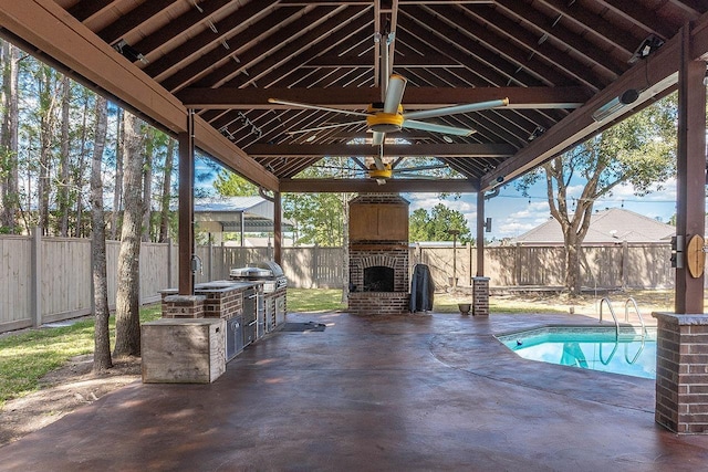 view of patio featuring a gazebo, an outdoor brick fireplace, ceiling fan, and area for grilling