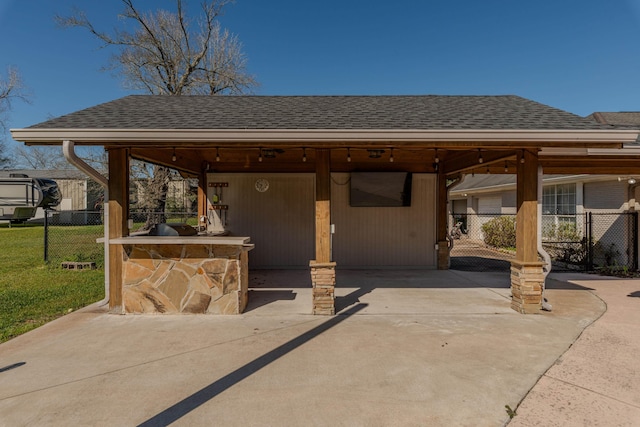 310 Junker Rd, Beaumont, TX 77707 - view of patio with a carport