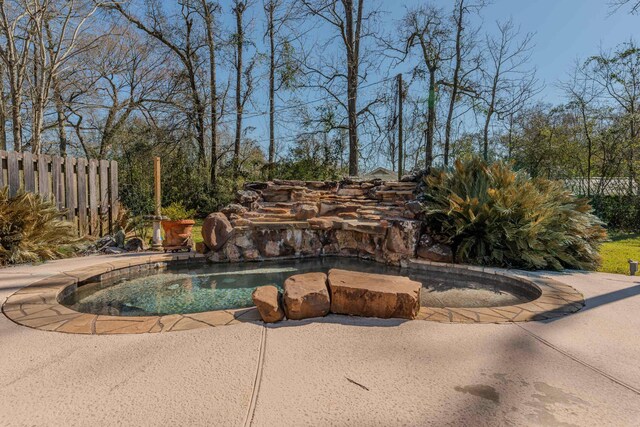 310 Junker Rd, Beaumont, TX 77707 - view of swimming pool featuring a patio area