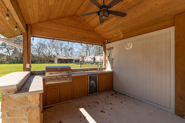 310 Junker Rd, Beaumont, TX 77707 - view of patio / terrace with wine cooler, a ceiling fan, and a sink