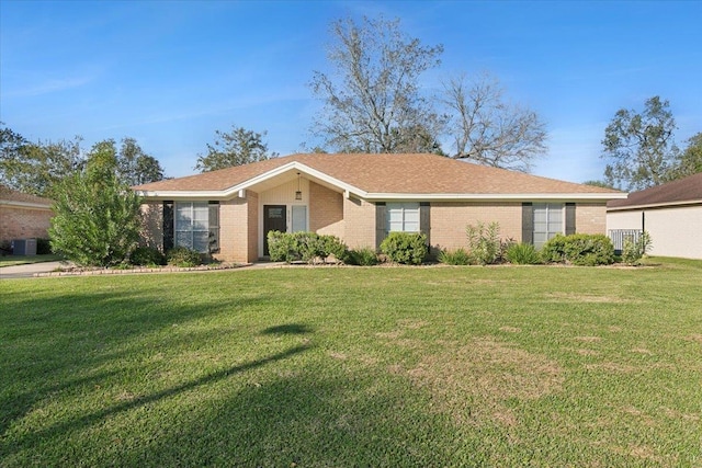 single story home with a front yard