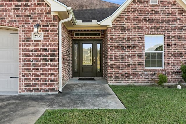 property entrance with a garage