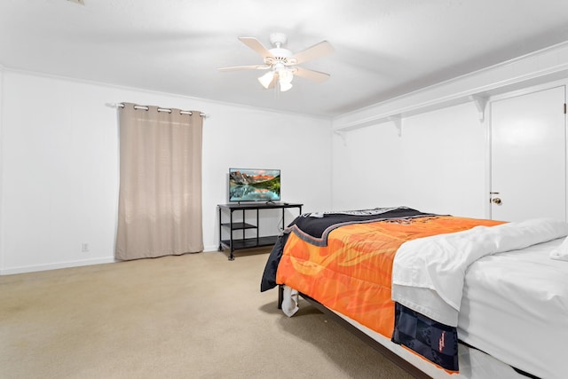 bedroom with ceiling fan and carpet