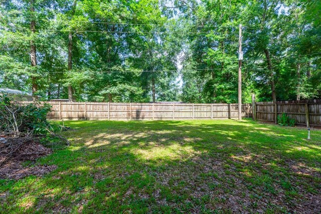 10754 Bonwell Loop, Kountze, TX 77625 - view of fenced backyard