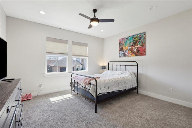 carpeted bedroom featuring recessed lighting, a ceiling fan, and baseboards