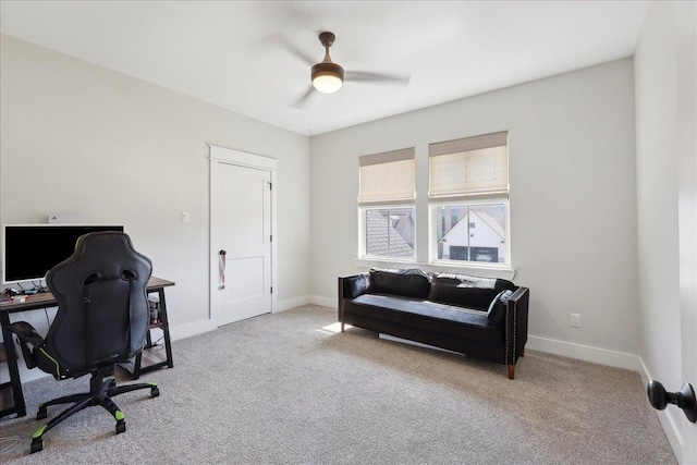 home office featuring baseboards, carpet, and ceiling fan