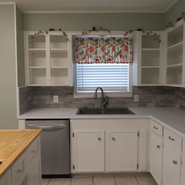 kitchen with white cabinets, dishwasher, open shelves, and a sink