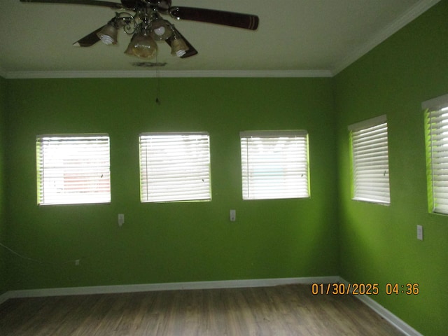 unfurnished room with crown molding, wood-type flooring, and ceiling fan