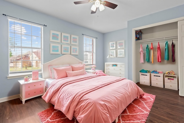1424 Arbor Ct, Nederland, TX 77627 - bedroom with wood finished floors, baseboards, a closet, and ceiling fan
