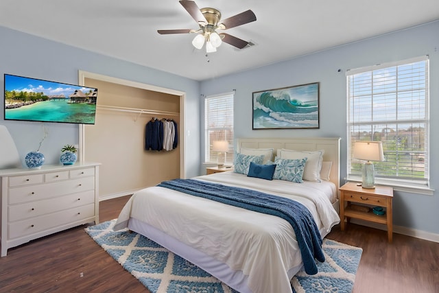 1424 Arbor Ct, Nederland, TX 77627 - bedroom with baseboards, dark wood-style floors, a closet, and ceiling fan