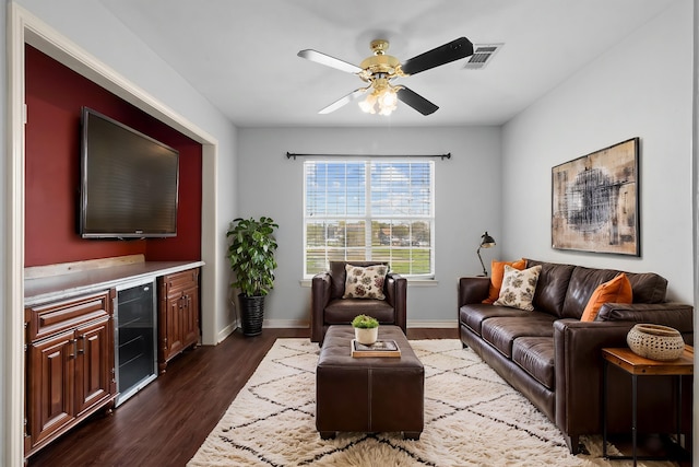 1424 Arbor Ct, Nederland, TX 77627 - living room with wine cooler, ceiling fan, dark wood-type flooring, and baseboards