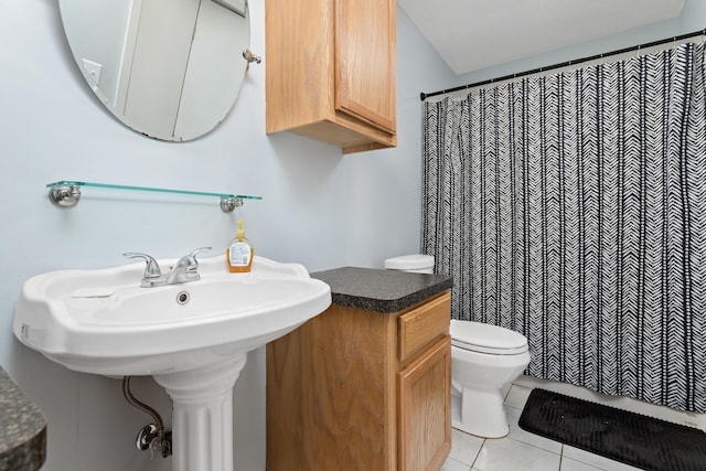 171 Ridgewood St, Bridge City, TX 77611 - bathroom with toilet, tile patterned flooring, and a shower with curtain