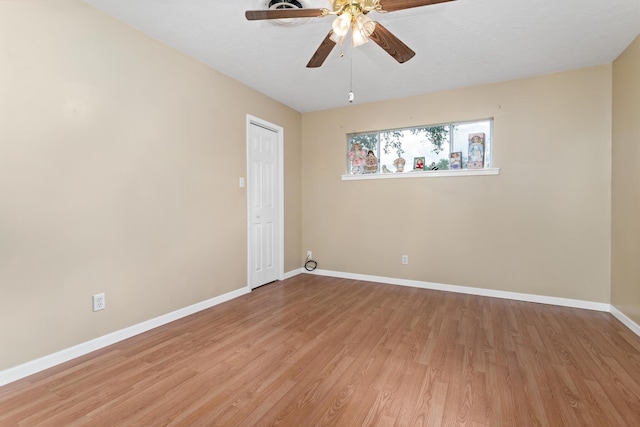171 Ridgewood St, Bridge City, TX 77611 - spare room with baseboards, light wood finished floors, and a ceiling fan