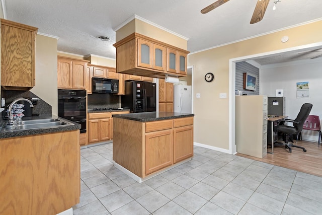 171 Ridgewood St, Bridge City, TX 77611 - kitchen with black appliances, a ceiling fan, a sink, light tile patterned flooring, and crown molding