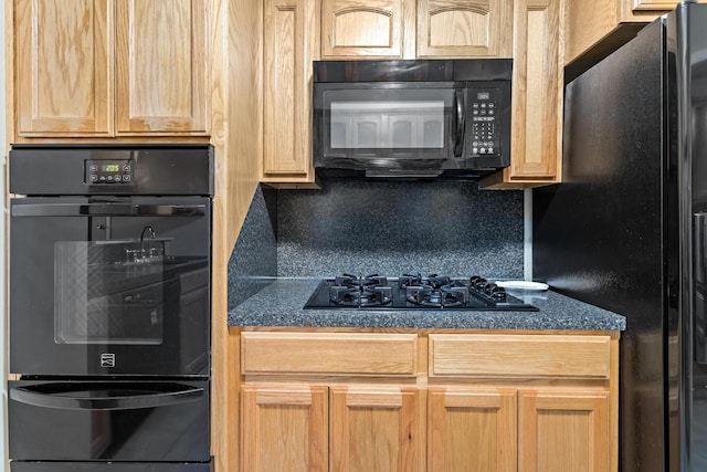 171 Ridgewood St, Bridge City, TX 77611 - kitchen featuring black appliances, dark countertops, light brown cabinetry, and decorative backsplash