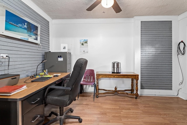 171 Ridgewood St, Bridge City, TX 77611 - home office featuring light wood-type flooring, a textured ceiling, crown molding, and ceiling fan