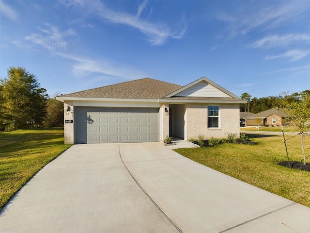 single story home featuring a garage and a front yard