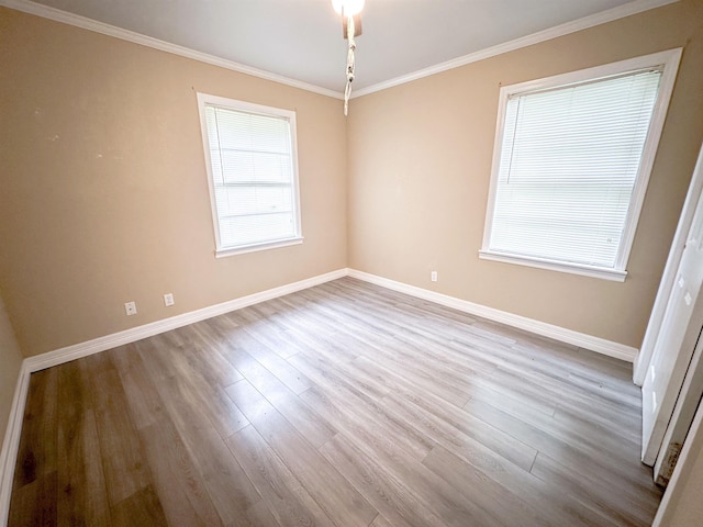 4438 W Edgar Ave, Orange, TX 77630 - spare room featuring wood finished floors and crown molding
