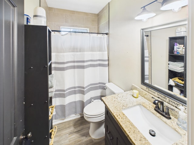7090 Carroll Ln, Beaumont, TX 77713 - full bath with vanity, wood finished floors, and a shower with shower curtain