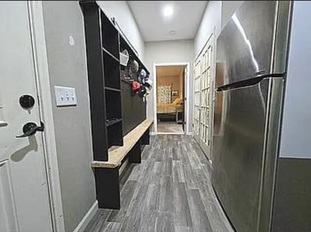 7090 Carroll Ln, Beaumont, TX 77713 - mudroom featuring dark wood-style flooring