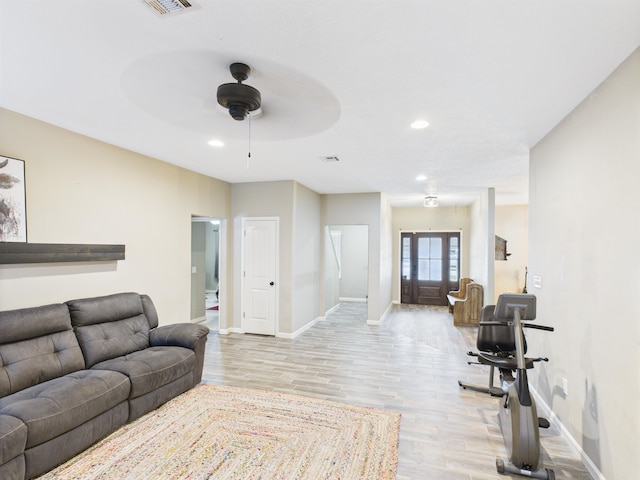 7090 Carroll Ln, Beaumont, TX 77713 - living area featuring light wood-type flooring, a ceiling fan, and recessed lighting
