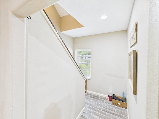 7090 Carroll Ln, Beaumont, TX 77713 - stairs featuring wood tiled floors and recessed lighting