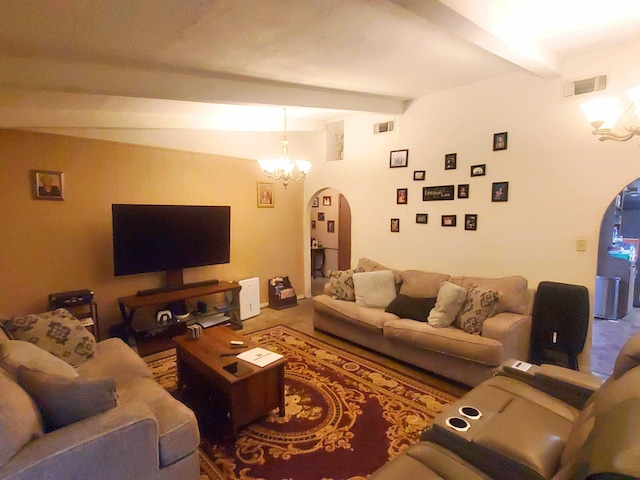 living room with carpet floors, arched walkways, beamed ceiling, a notable chandelier, and visible vents