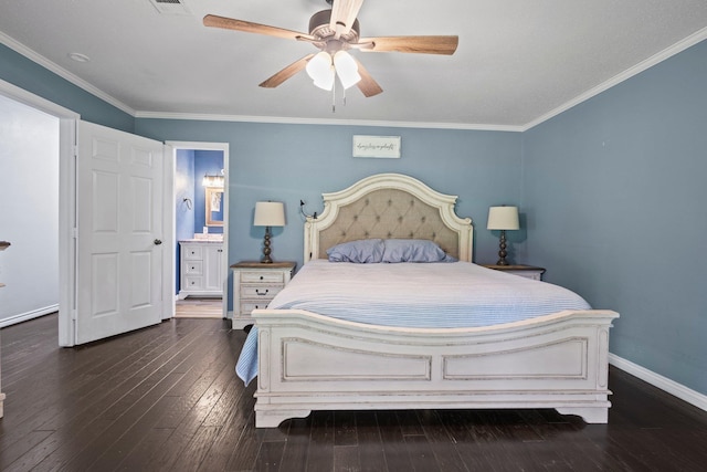 4169 Leatherwood Dr, Kountze, TX 77625 - bedroom with dark wood-style flooring, ceiling fan, ensuite bath, and crown molding