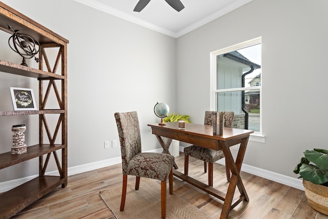 office featuring crown molding, light hardwood / wood-style floors, and ceiling fan