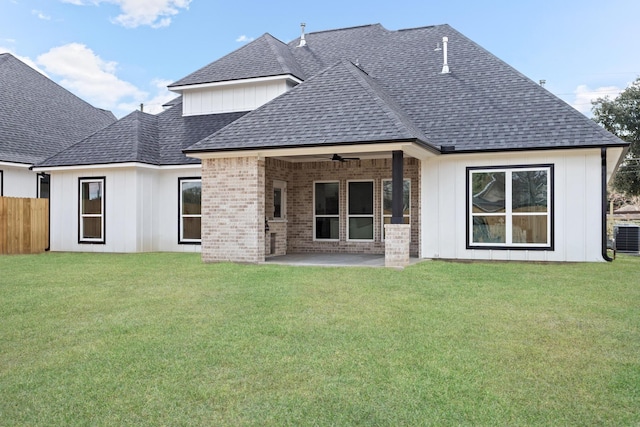 rear view of property with a patio, central AC, ceiling fan, and a lawn