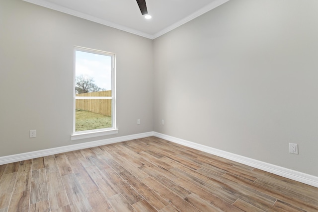 unfurnished room featuring crown molding, ceiling fan, and light hardwood / wood-style floors