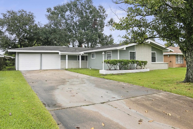 single story home featuring a front yard and a garage