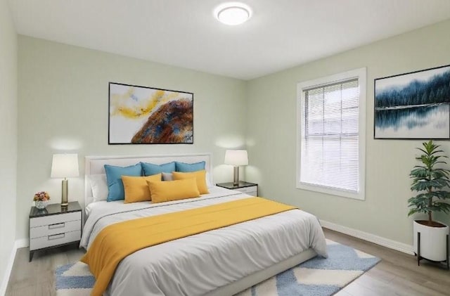 bedroom featuring light wood-type flooring