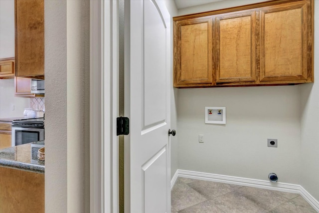 laundry area with hookup for a washing machine, light tile patterned floors, cabinets, and hookup for an electric dryer