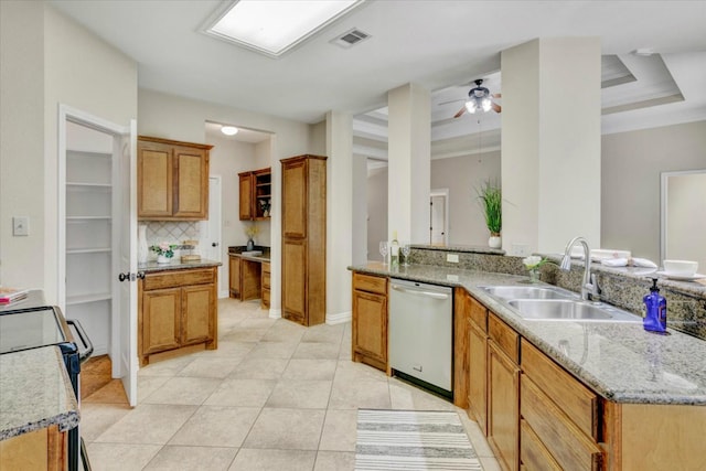 kitchen with kitchen peninsula, stainless steel dishwasher, ceiling fan, sink, and range with electric stovetop