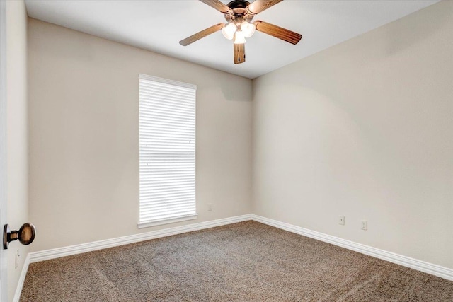 unfurnished room featuring ceiling fan and carpet floors