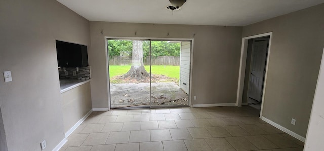 entryway featuring light tile patterned floors