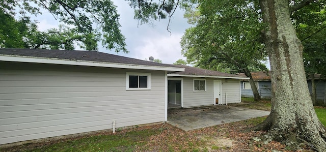 rear view of house with a patio area