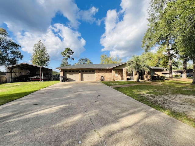 ranch-style house featuring a carport and a front yard