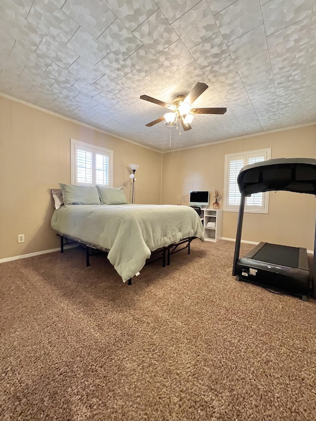 bedroom with carpet floors, ceiling fan, and ornamental molding