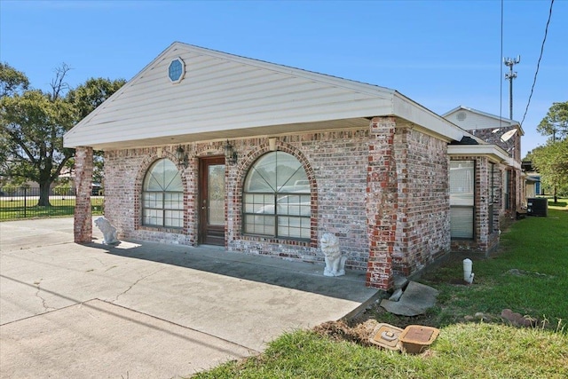 view of front of property with central AC unit