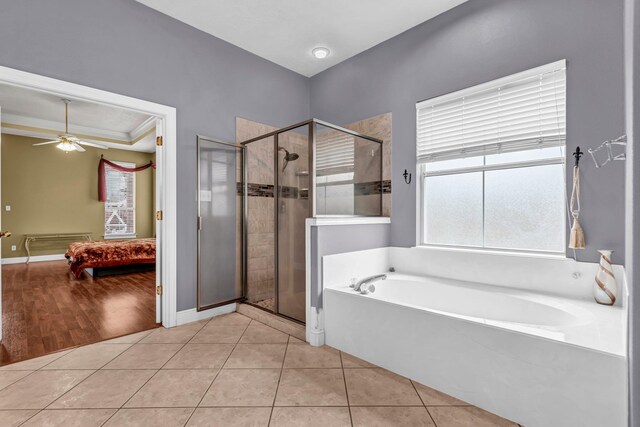 bathroom featuring tile patterned floors, ceiling fan, crown molding, and independent shower and bath