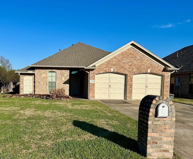 single story home with a front yard and a garage