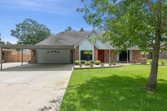 view of front of house featuring a carport, a garage, and a front lawn