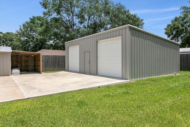 garage with a yard